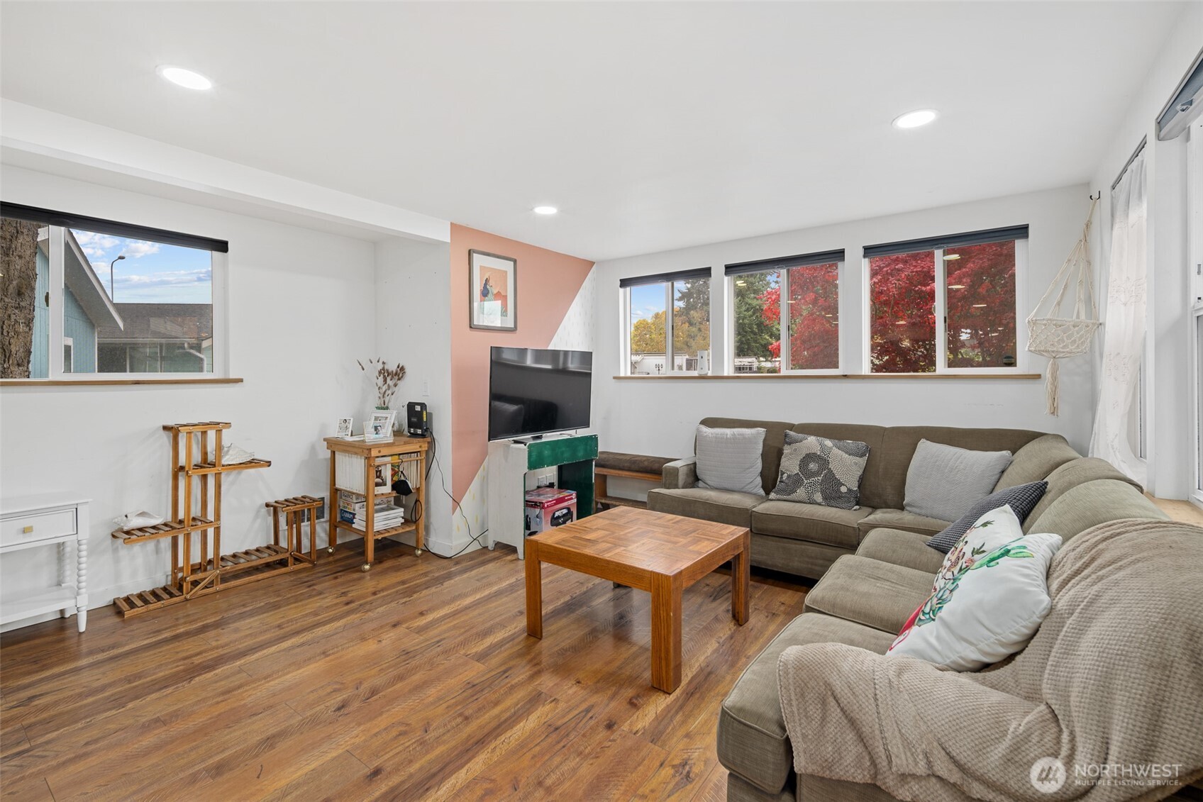 1645 South 272nd Street, Unit 13 Federal Way, WA 98003 - Photo 7 of 27 a living room with furniture and a flat screen tv