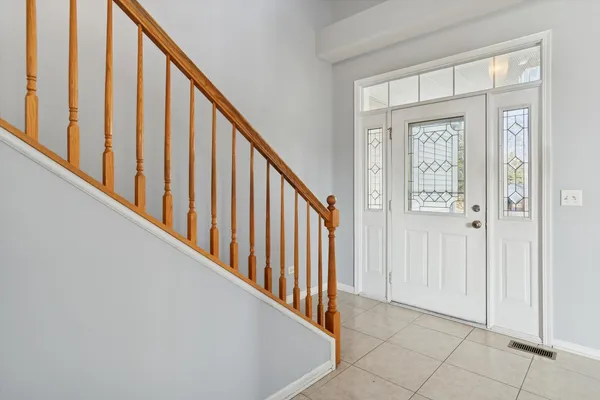 a view of a hallway with staircase