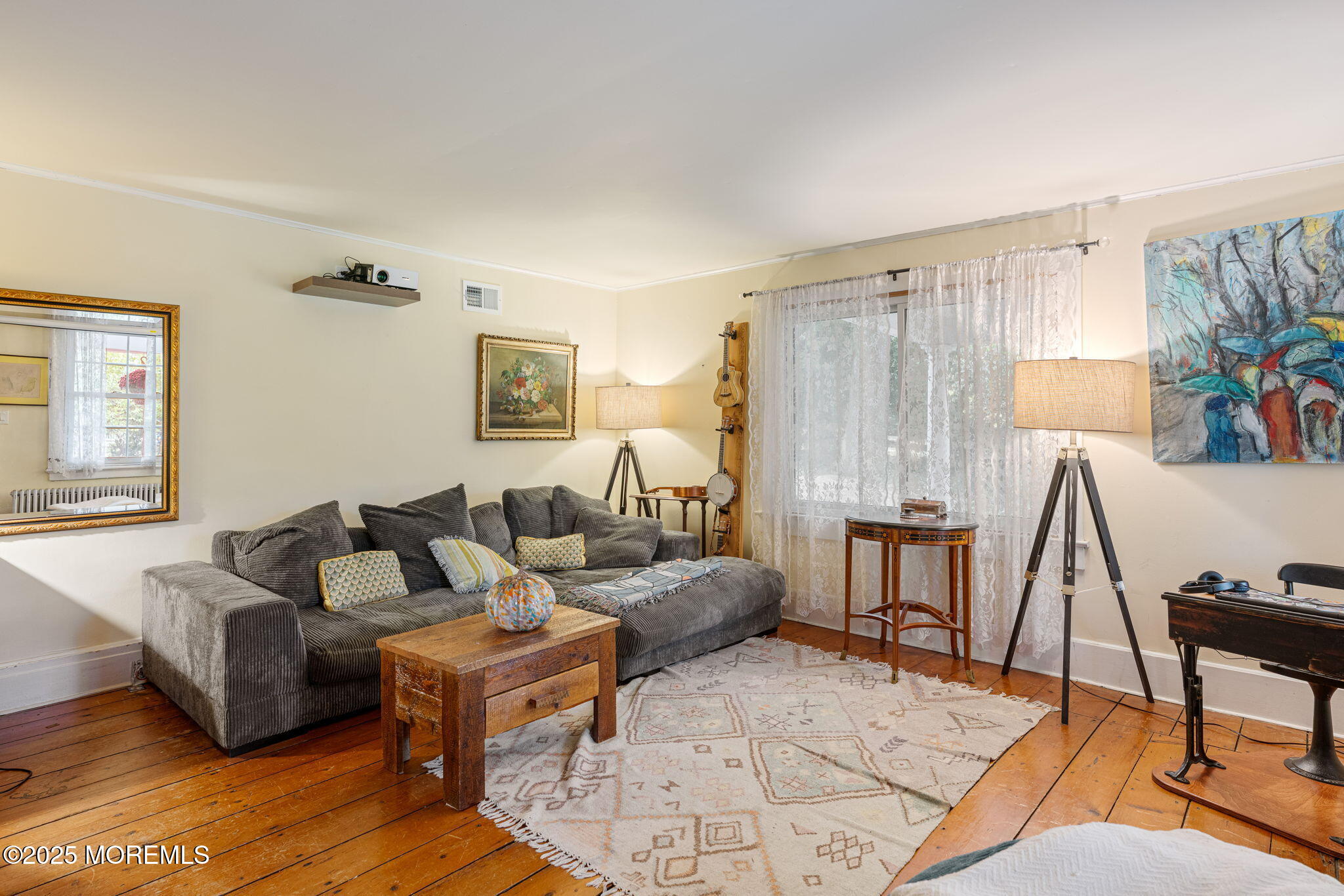 139 Monmouth Avenue Atlantic Highlands, NJ 07716 - Photo 11 of 40 a living room with furniture and a wooden floor