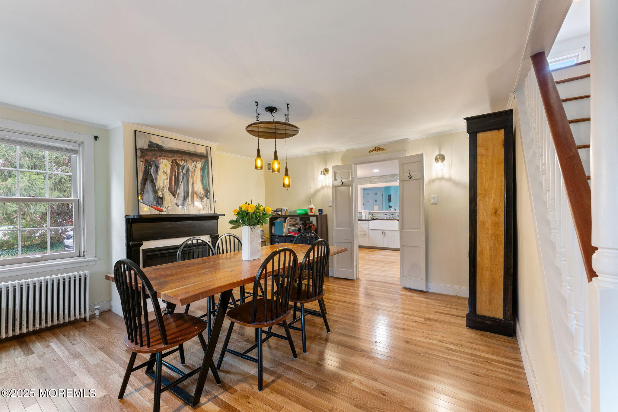 139 Monmouth Avenue Atlantic Highlands, NJ 07716 - Photo 12 of 40 a view of a dining room with furniture and wooden floor