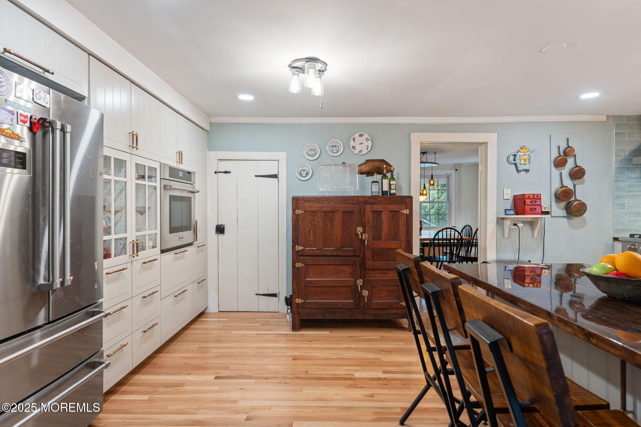 139 Monmouth Avenue Atlantic Highlands, NJ 07716 - Photo 15 of 40 a view of a dining room with furniture a rug and wooden floor