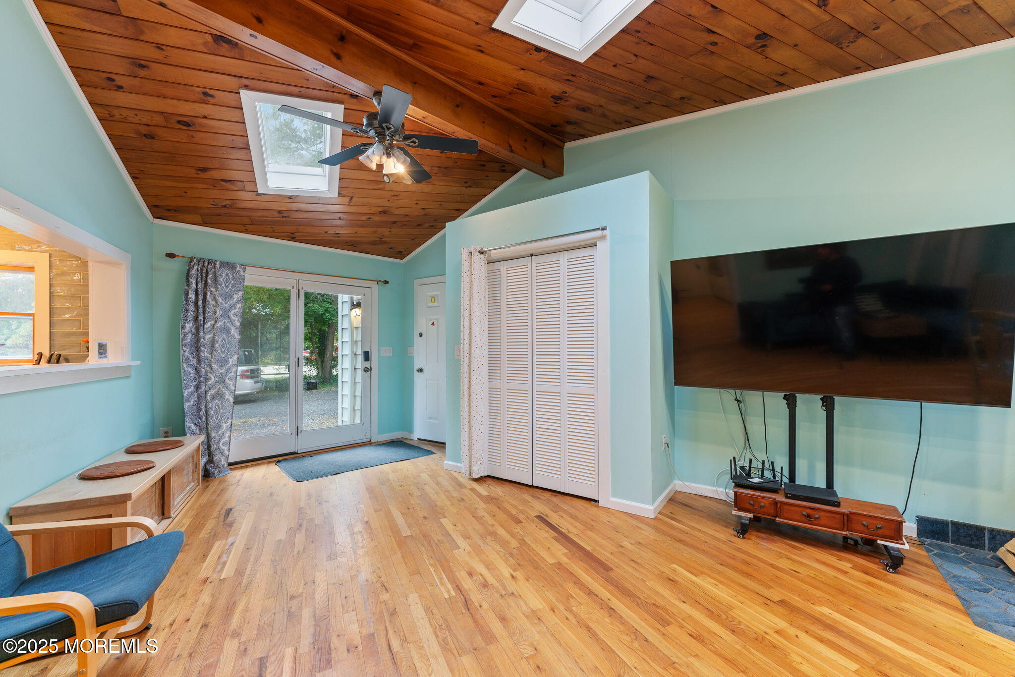 139 Monmouth Avenue Atlantic Highlands, NJ 07716 - Photo 20 of 40 a bedroom with furniture and a flat screen tv