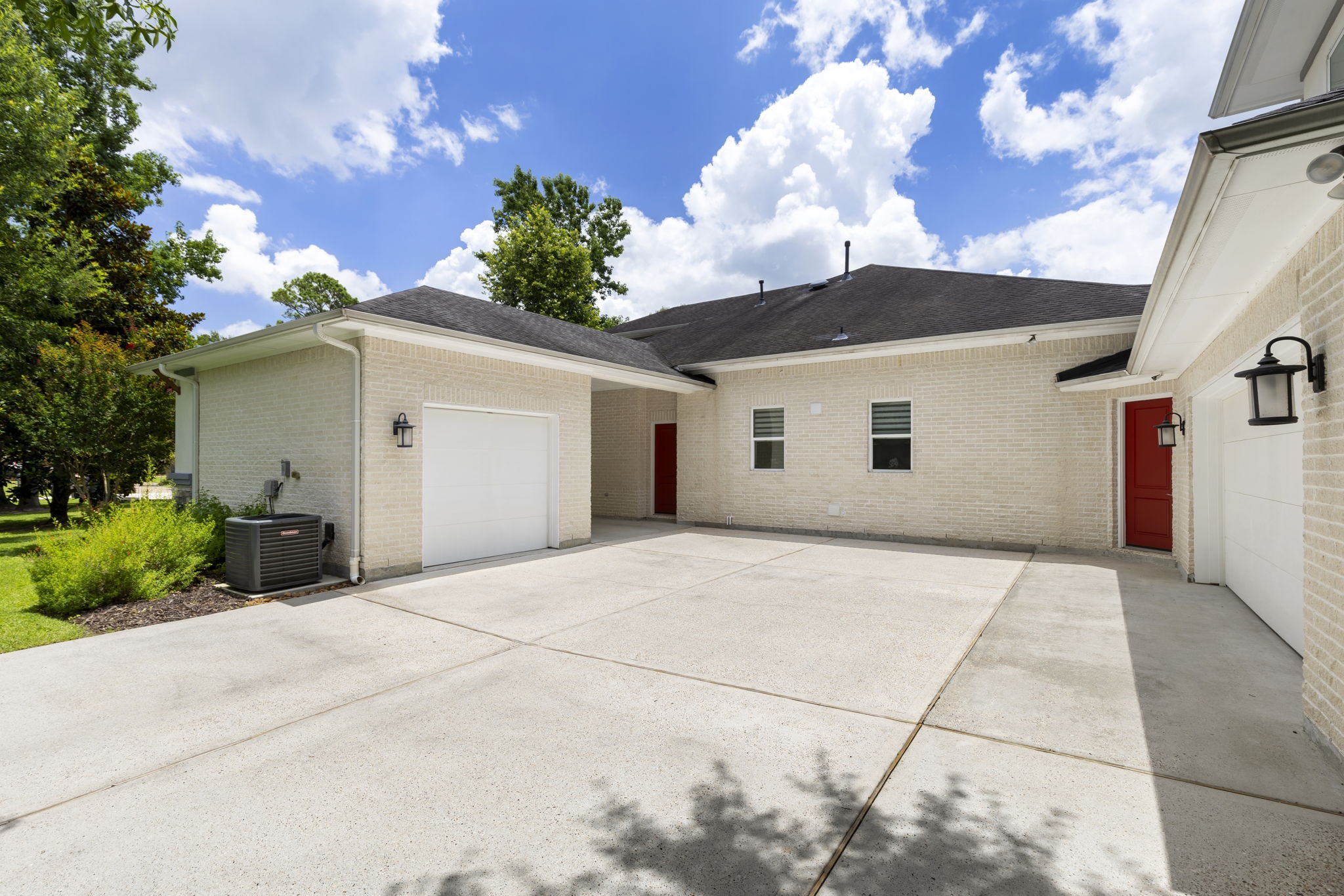 3918 Almond Court Spring, TX 77386 - Photo 38 of 42 a view of a white house with a yard