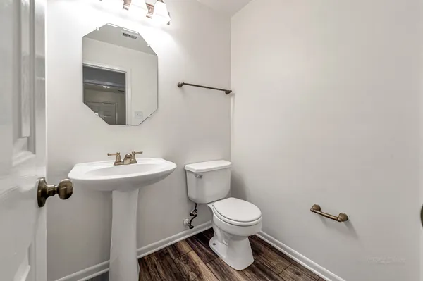 a view of a room with wooden racks