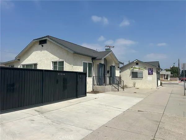 a front view of a house with a garage