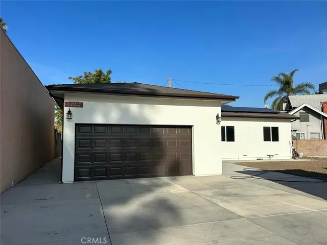 a view of a house with a garage