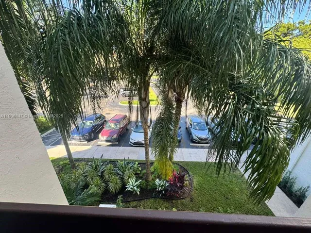 a view of a backyard with a garden