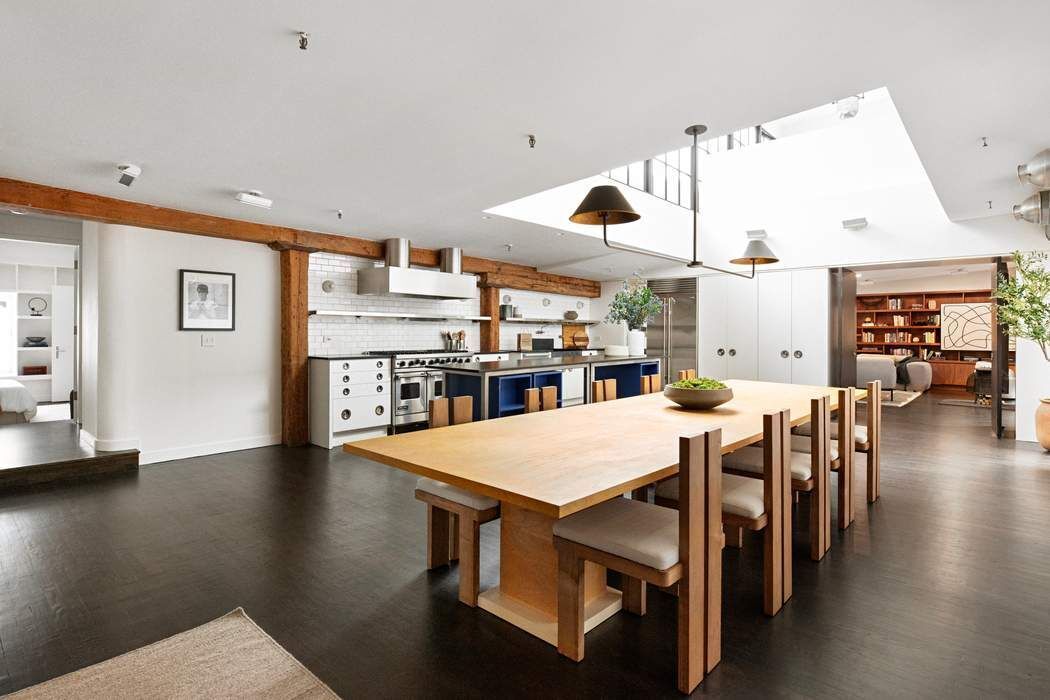 288 West Street, Unit PH Manhattan, NY 10013 - Photo 13 of 19 a large kitchen with a table and chairs