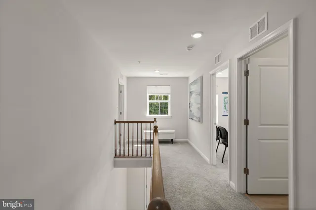 a view of entryway with livingroom