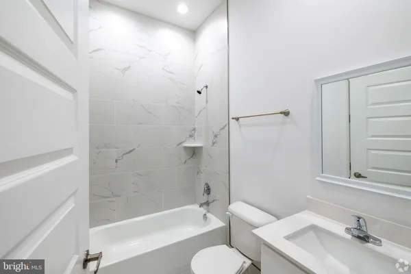 a bathroom with a sink and a bathtub