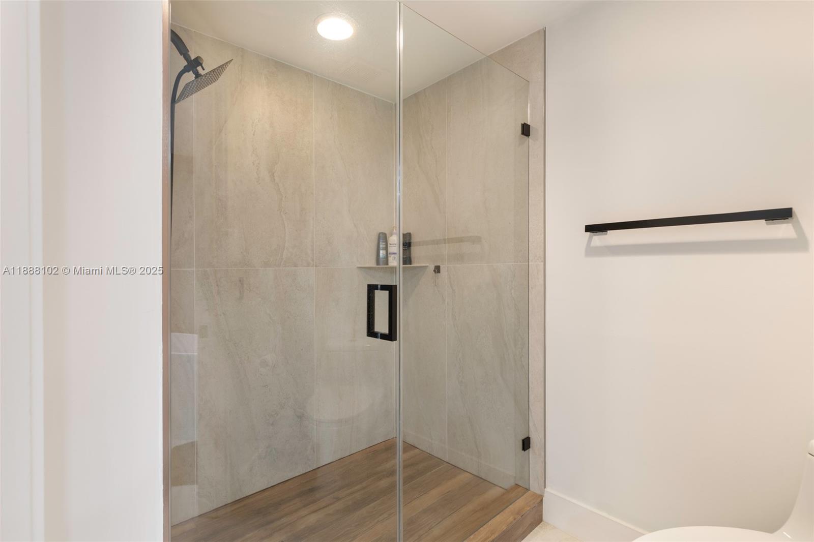 3370 Hidden Bay Drive, Unit 409 Aventura, FL 33180 - Photo 14 of 20 a bathroom with a shower