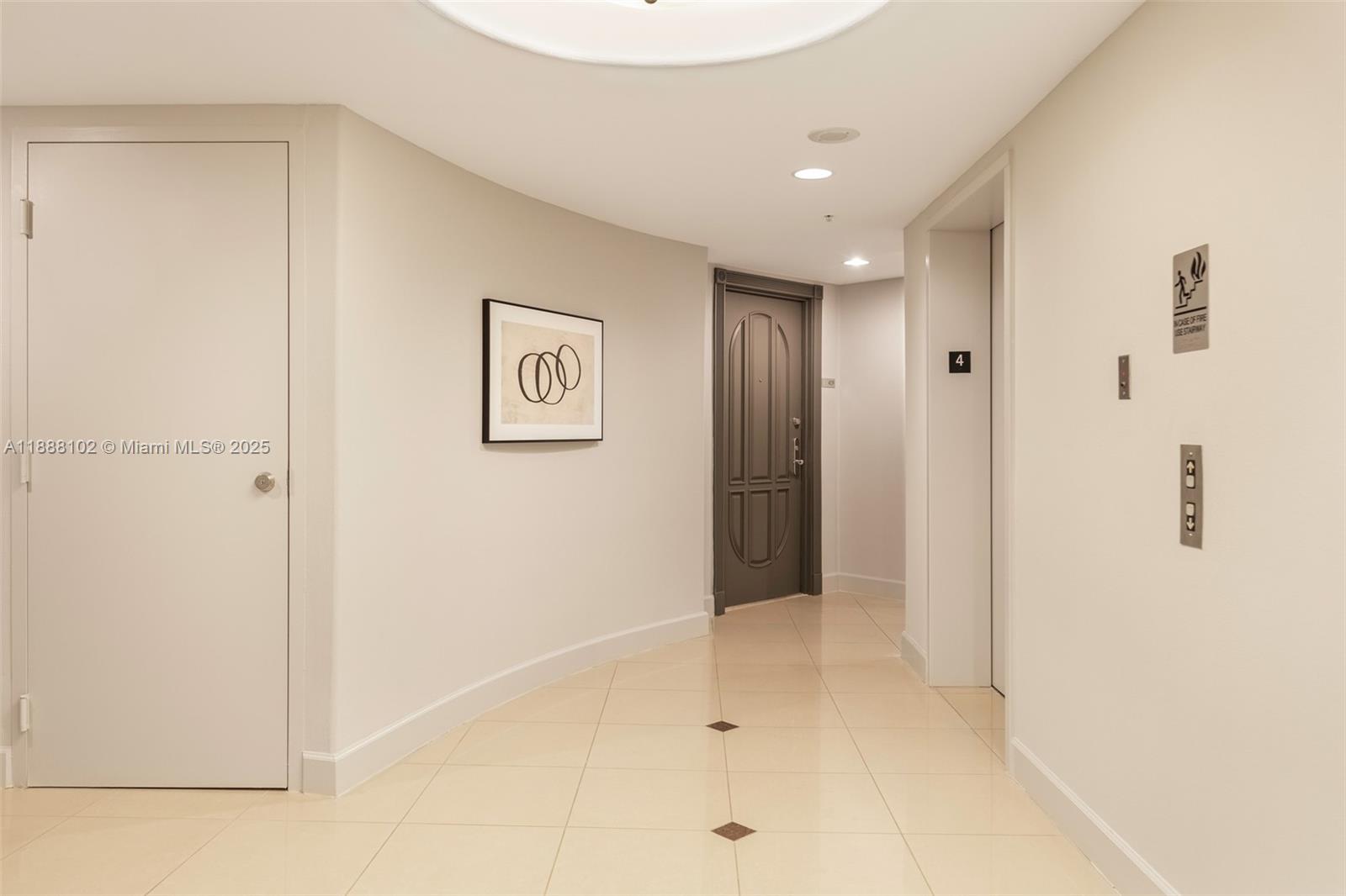 3370 Hidden Bay Drive, Unit 409 Aventura, FL 33180 - Photo 20 of 20 a view of a hallway with wooden floor