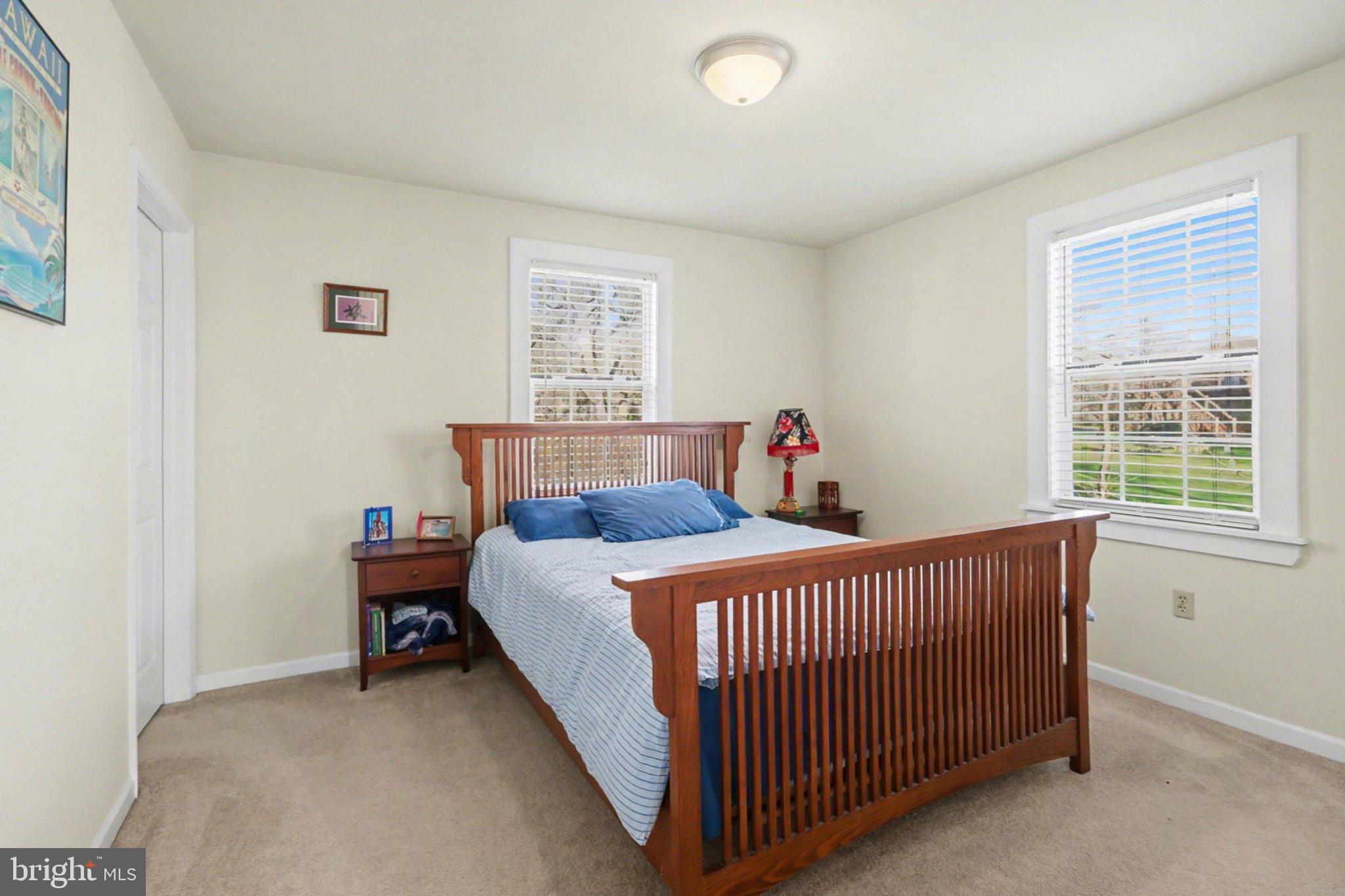 88 McAllister Church Road Carlisle, PA 17015 - Photo 11 of 43 a bedroom with a bed and a window
