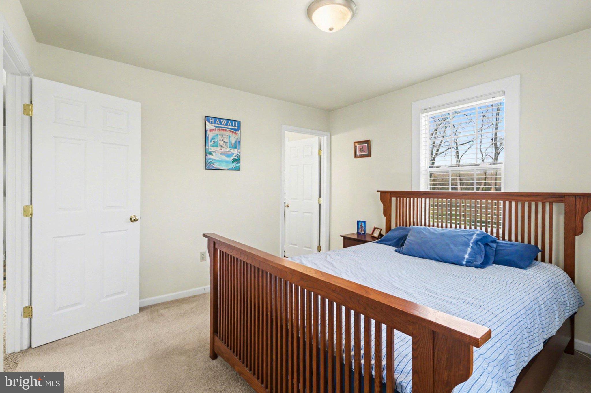 88 McAllister Church Road Carlisle, PA 17015 - Photo 13 of 43 a bedroom with a bed and a window