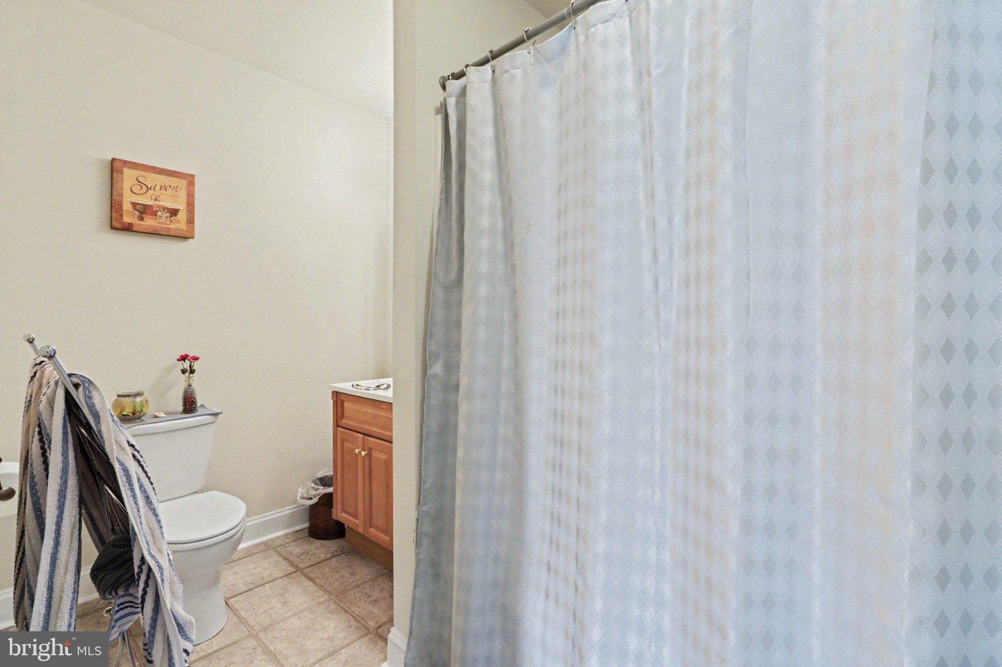 88 McAllister Church Road Carlisle, PA 17015 - Photo 18 of 43 a white toilet sitting next to a small bathroom