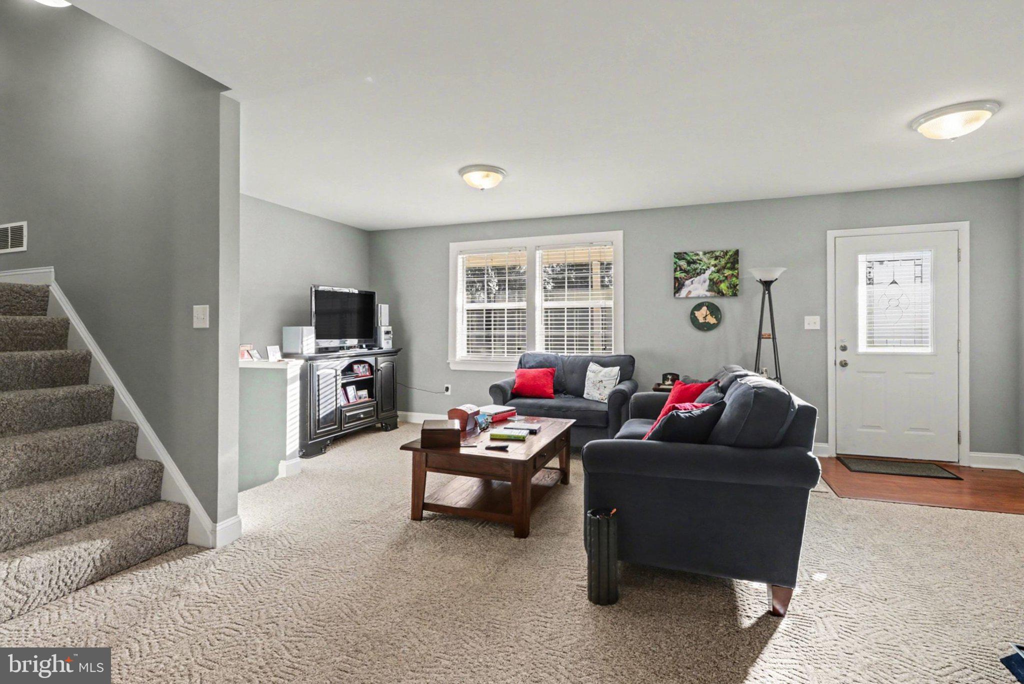 88 McAllister Church Road Carlisle, PA 17015 - Photo 2 of 43 a living room with furniture and a window