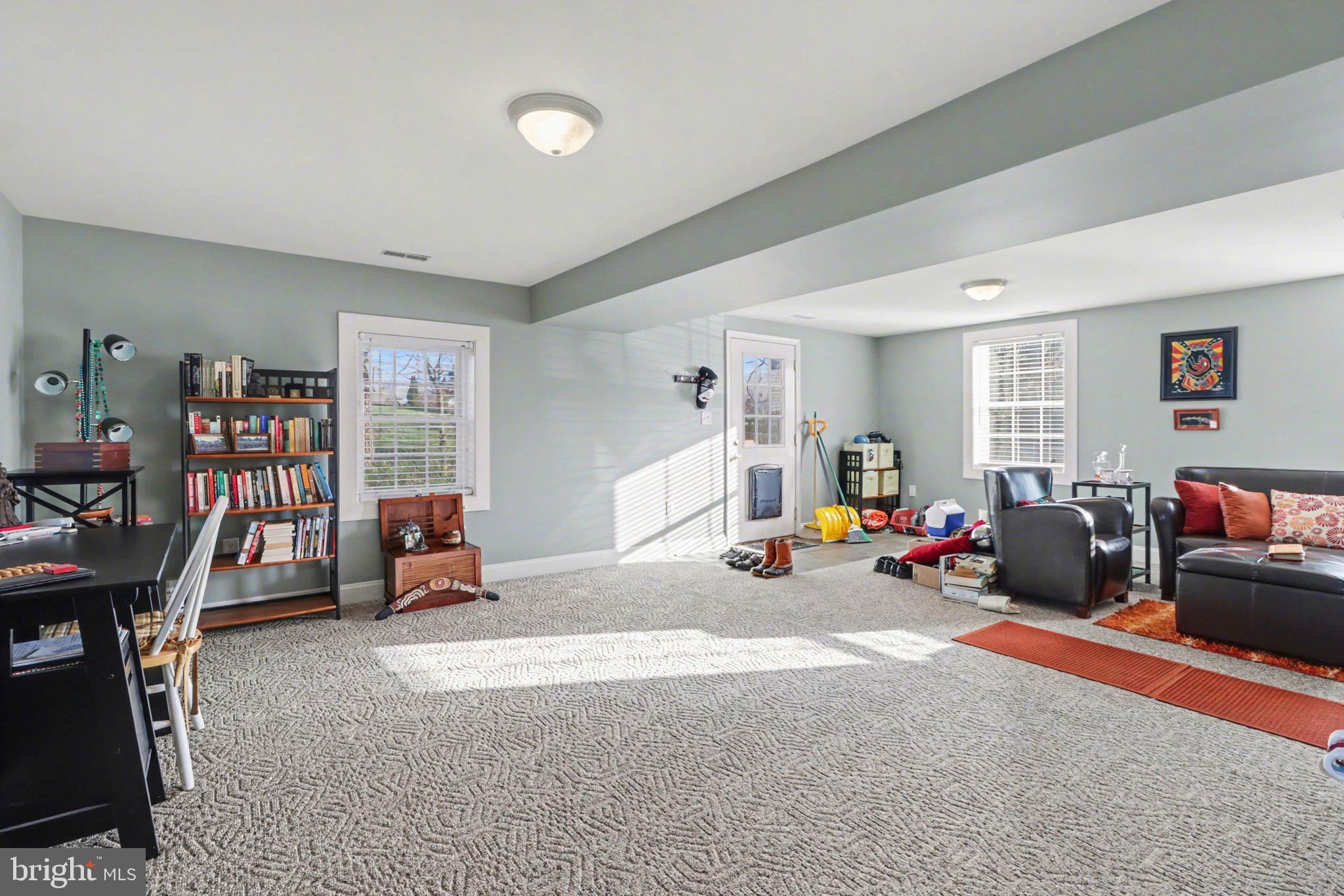 88 McAllister Church Road Carlisle, PA 17015 - Photo 23 of 43 a living room with furniture and a wooden floor