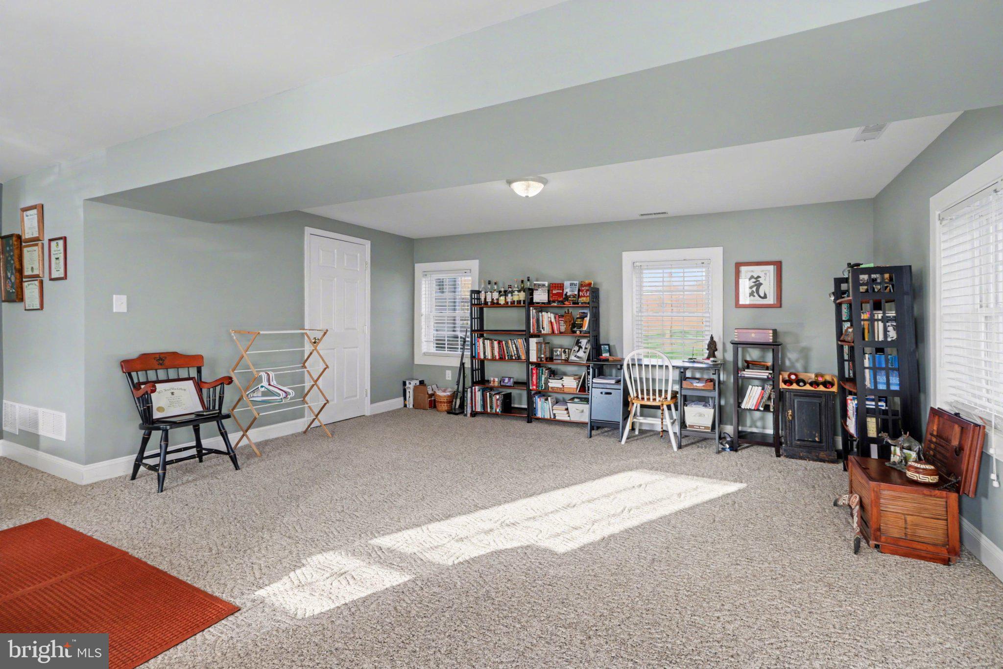 88 McAllister Church Road Carlisle, PA 17015 - Photo 24 of 43 a living room with furniture and a window