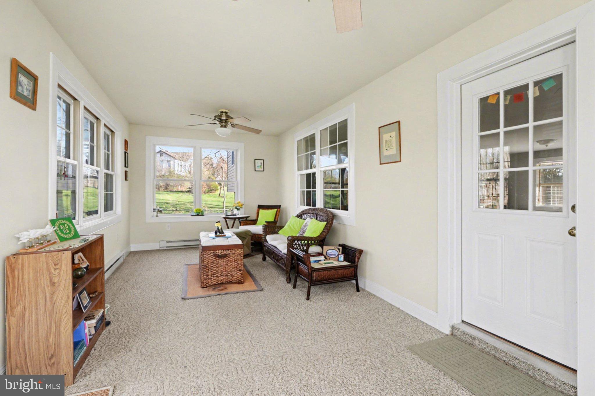 88 McAllister Church Road Carlisle, PA 17015 - Photo 25 of 43 a living room with furniture and windows