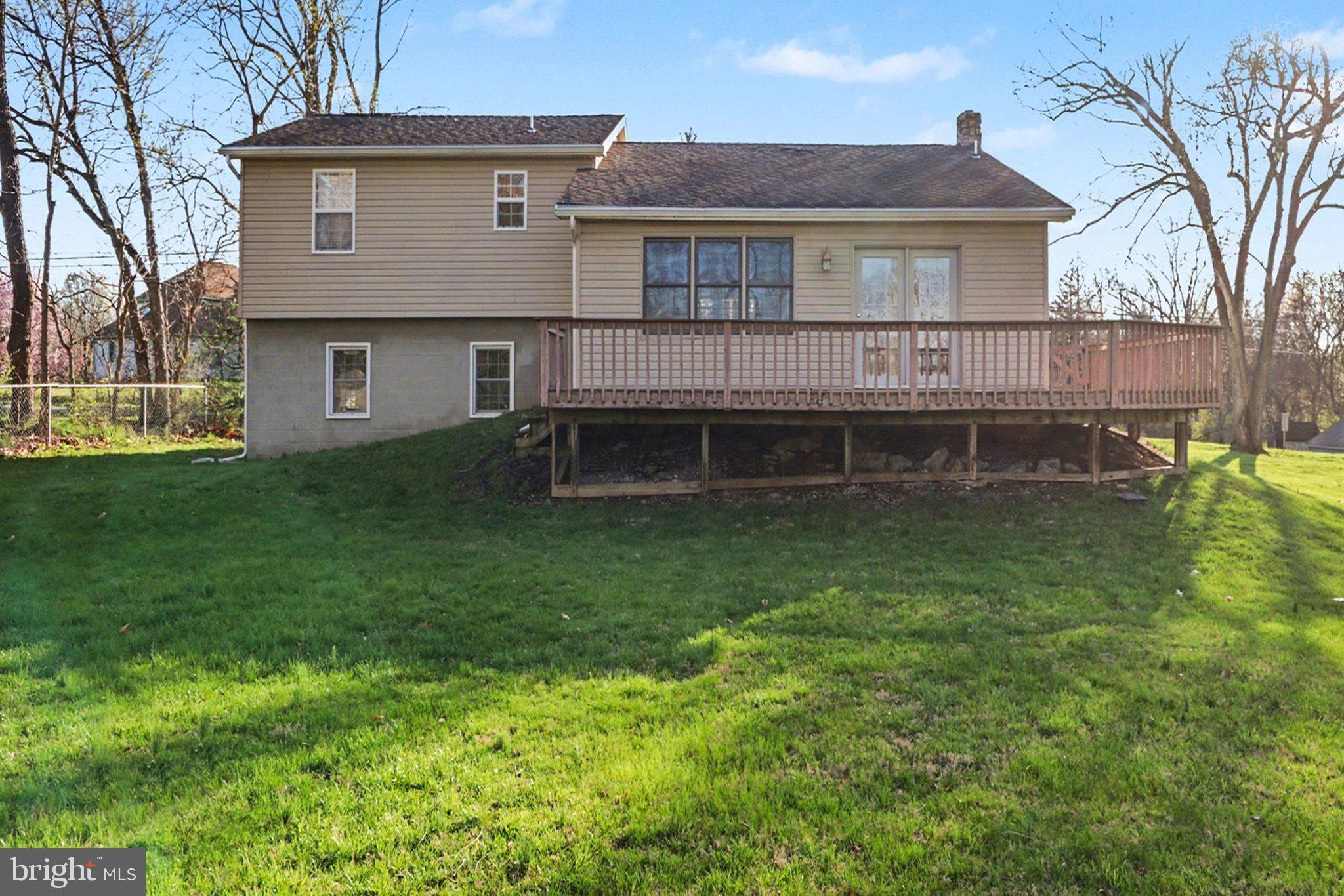88 McAllister Church Road Carlisle, PA 17015 - Photo 36 of 43 a house view with a garden space