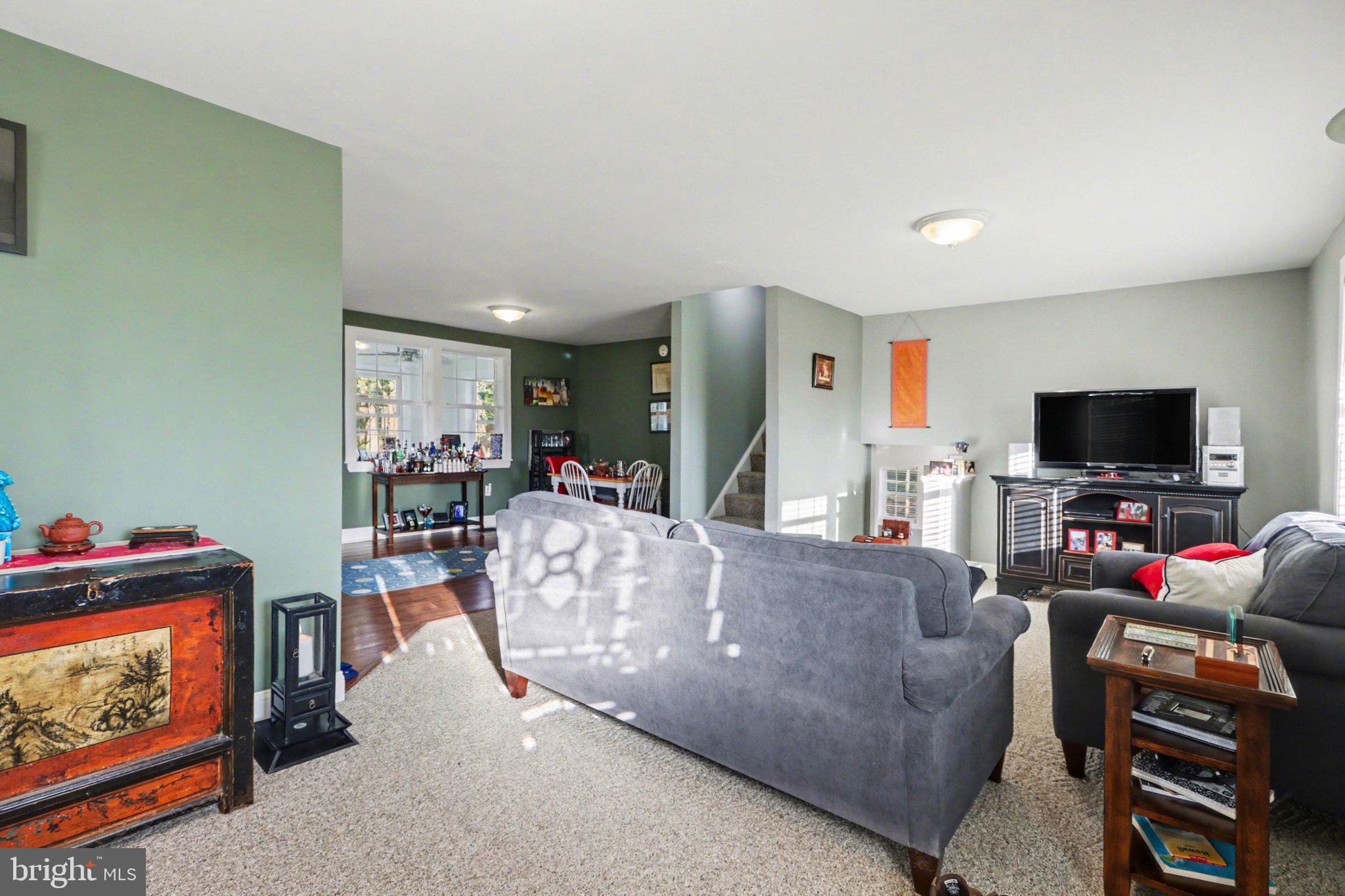 88 McAllister Church Road Carlisle, PA 17015 - Photo 5 of 43 a living room with furniture and a flat screen tv