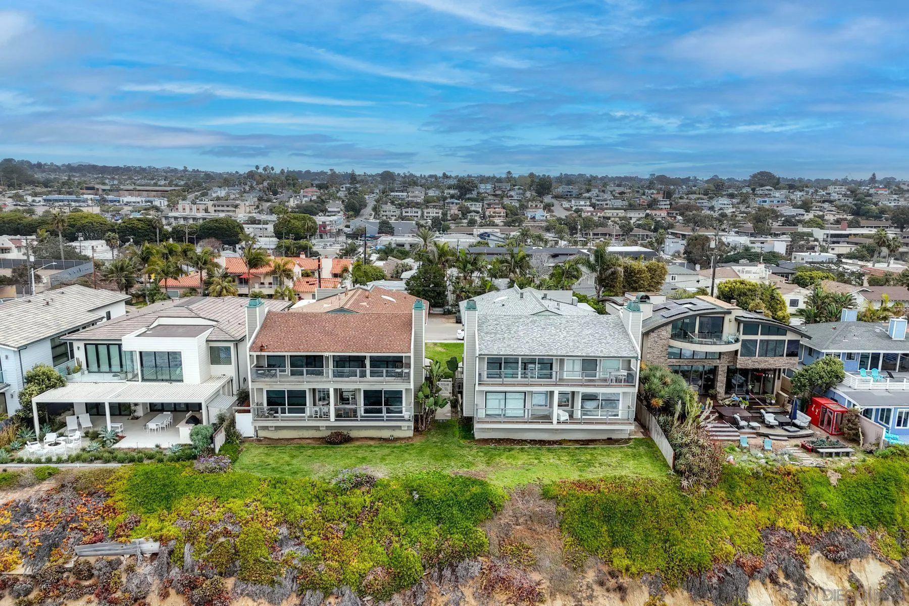 720 4th Street, Unit 1 Encinitas, CA 92024 - Photo 11 of 29 an aerial view of residential houses with outdoor space