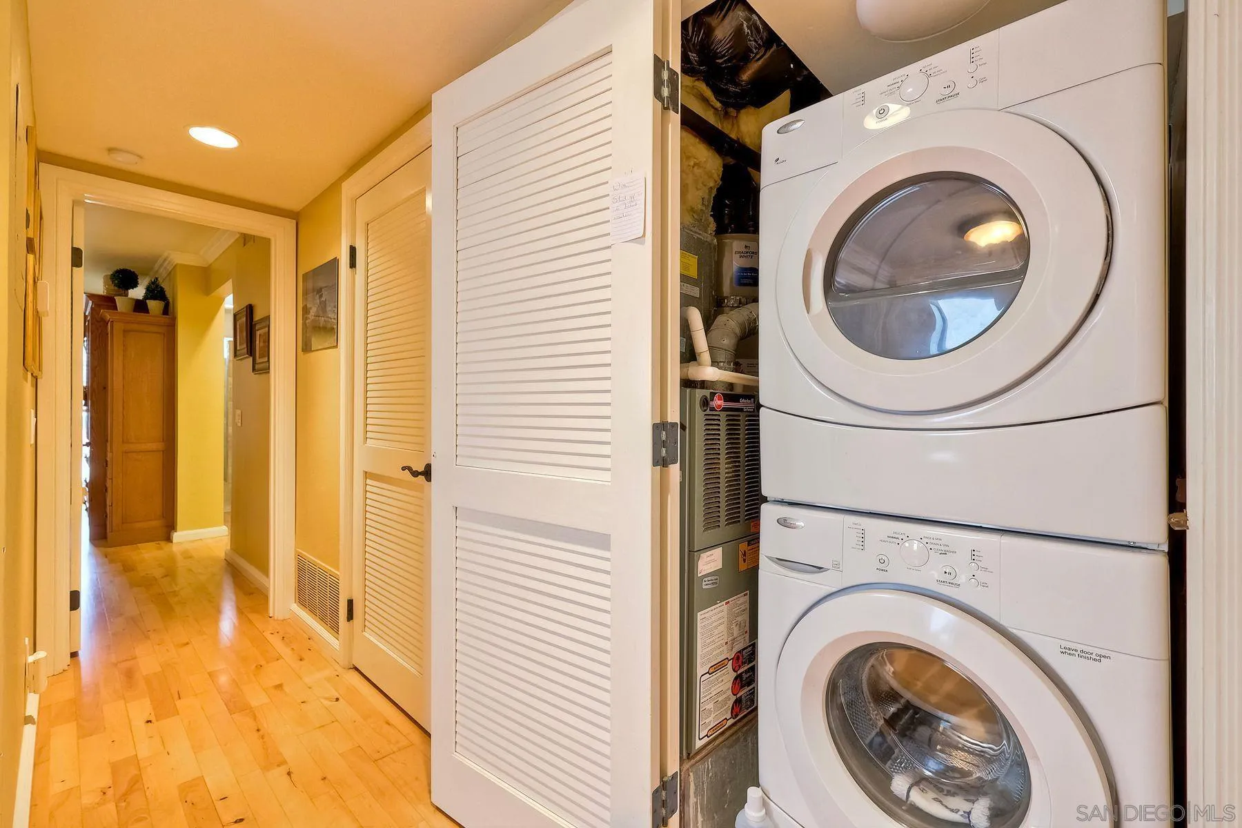 720 4th Street, Unit 1 Encinitas, CA 92024 - Photo 27 of 29 a bathroom with a toilet and a sink
