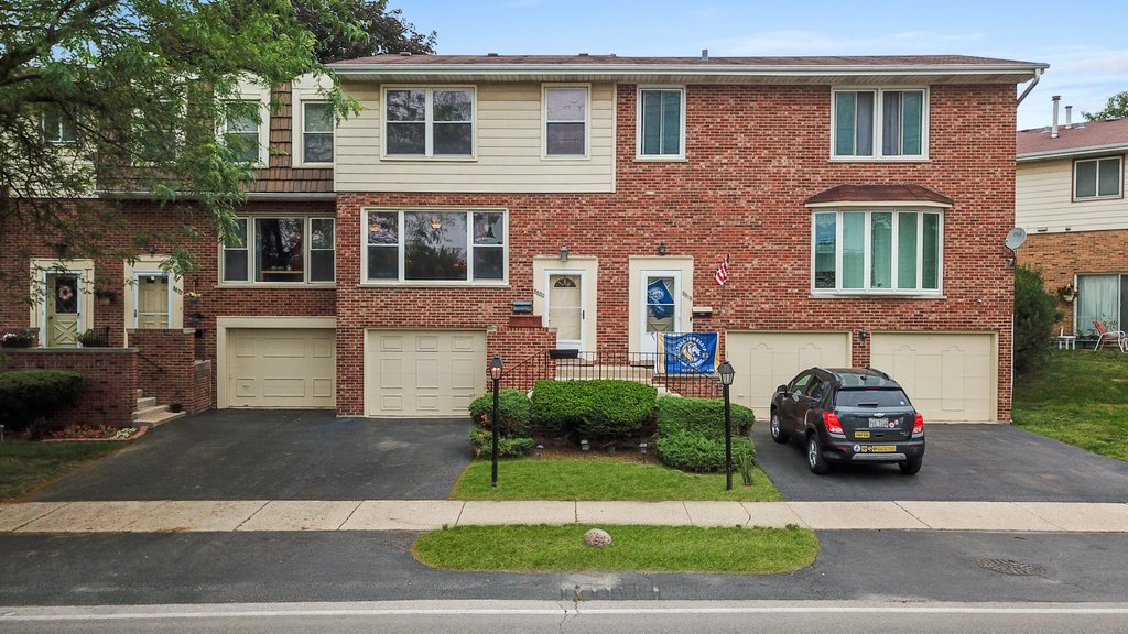 a car parked in front of a house