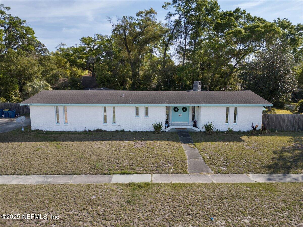 1669 Townsend Boulevard Jacksonville, FL 32211 - Photo 1 of 70 a front view of a house with a yard