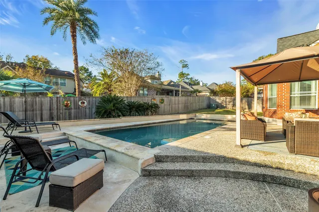 a front view of a house with swimming pool