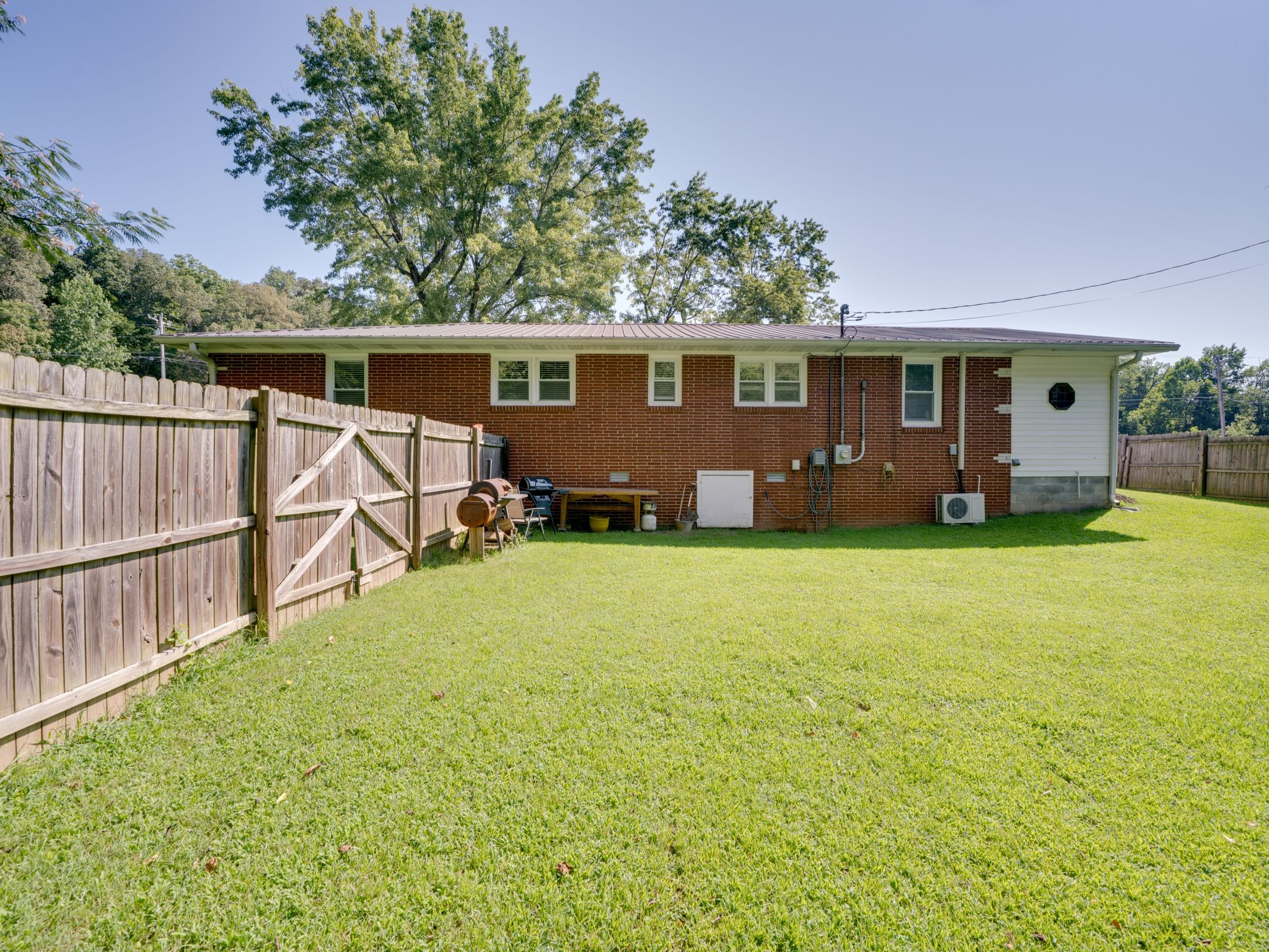 125 The Trace Dover, TN 37058 - Photo 26 of 29 a view of a yard in front of a house with large trees
