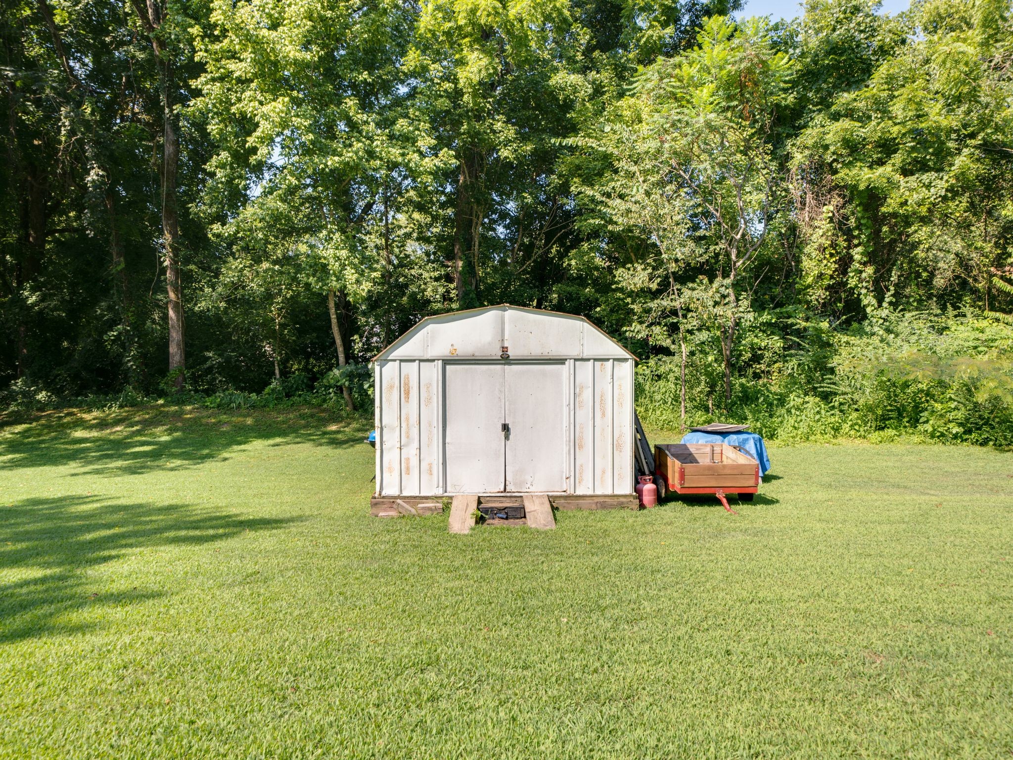 125 The Trace Dover, TN 37058 - Photo 28 of 29 a view of a tiny house with yard and outdoor seating