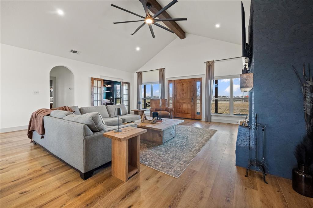 618 Minnis Road Collinsville, TX 76233 - Photo 11 of 37 a living room with furniture and a wooden floor