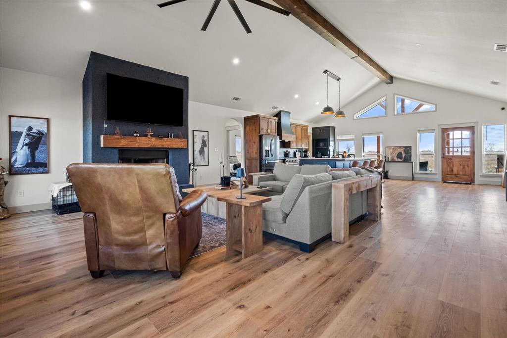 618 Minnis Road Collinsville, TX 76233 - Photo 14 of 37 a living room with stainless steel appliances furniture and a flat screen tv