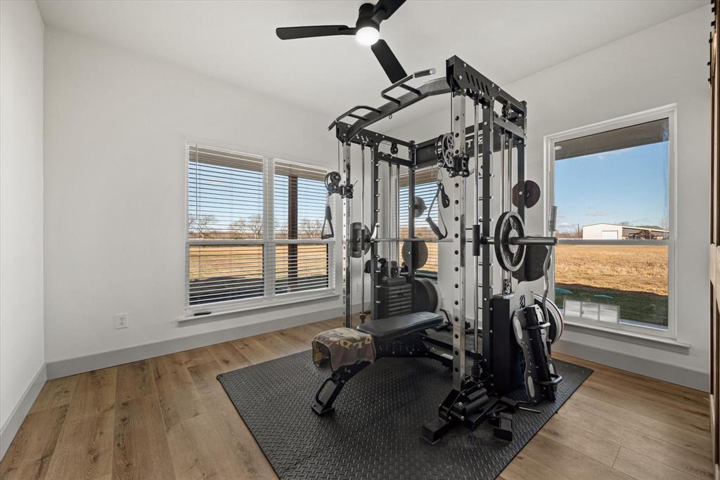 618 Minnis Road Collinsville, TX 76233 - Photo 31 of 37 a view of a room with gym equipment