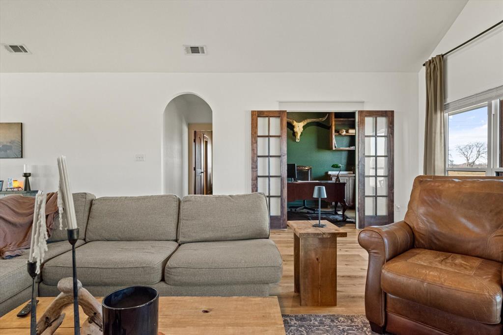 618 Minnis Road Collinsville, TX 76233 - Photo 32 of 37 a living room with furniture and a large window