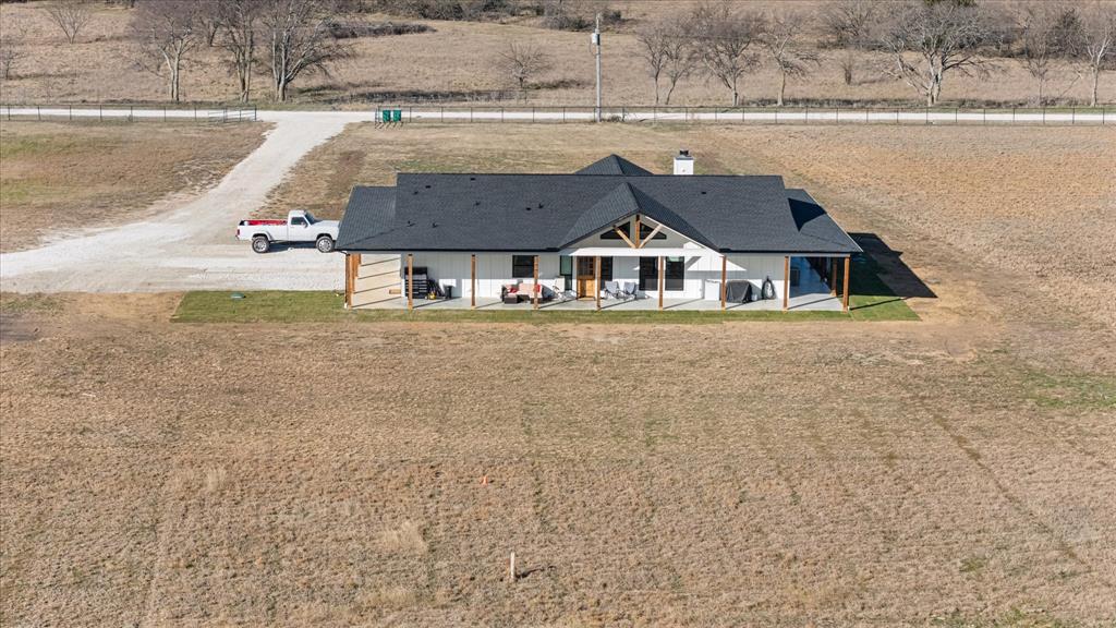 618 Minnis Road Collinsville, TX 76233 - Photo 4 of 37 an aerial view of a house with a yard