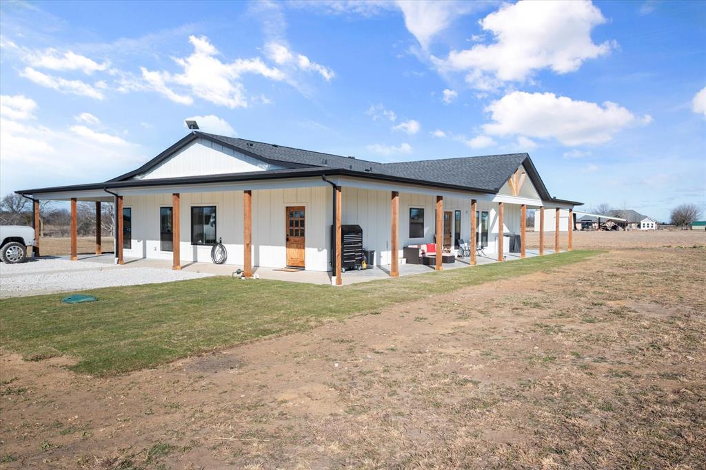 618 Minnis Road Collinsville, TX 76233 - Photo 9 of 37 a front view of a house with a yard