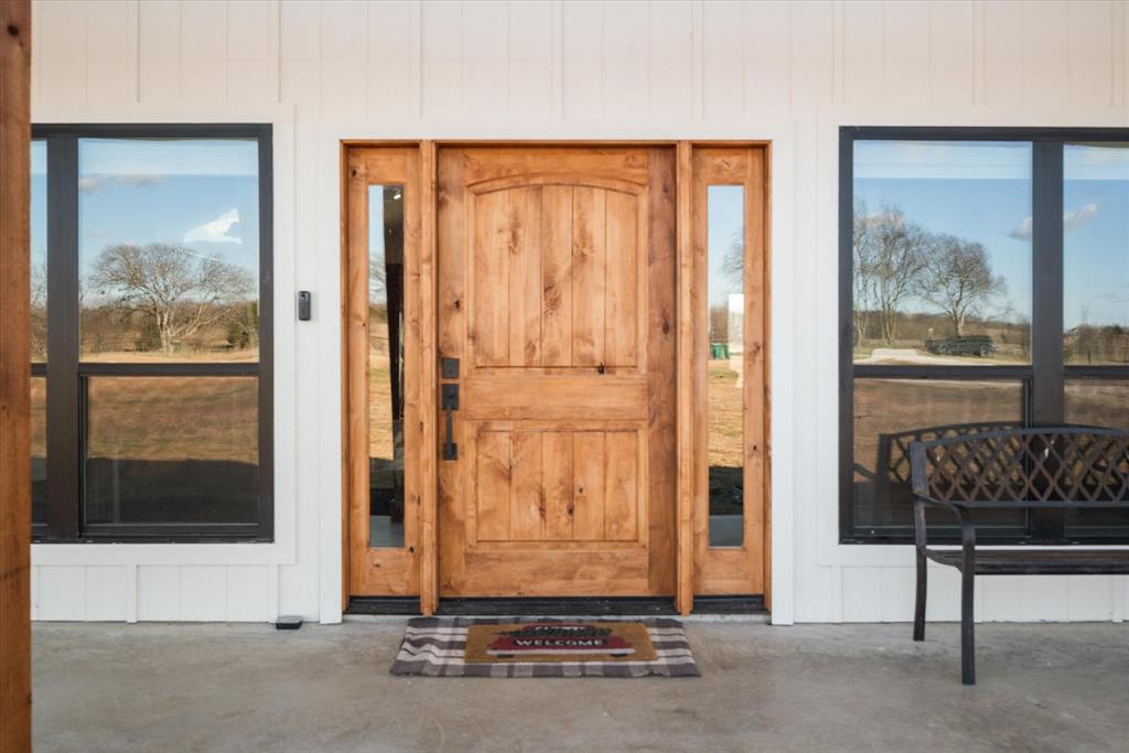 618 Minnis Road Collinsville, TX 76233 - Photo 10 of 37 a view of outdoor space with wooden floor and windows