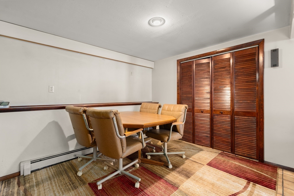 7 Van Beal Road Randolph, MA 02368 - Photo 24 of 35 a view of a workspace with furniture and a window