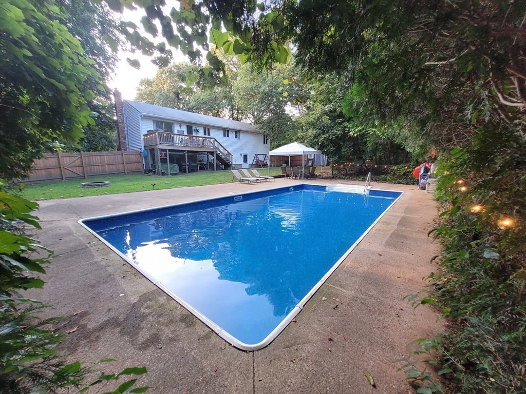 7 Van Beal Road Randolph, MA 02368 - Photo 30 of 35 a view of a swimming pool with a lounge chairs