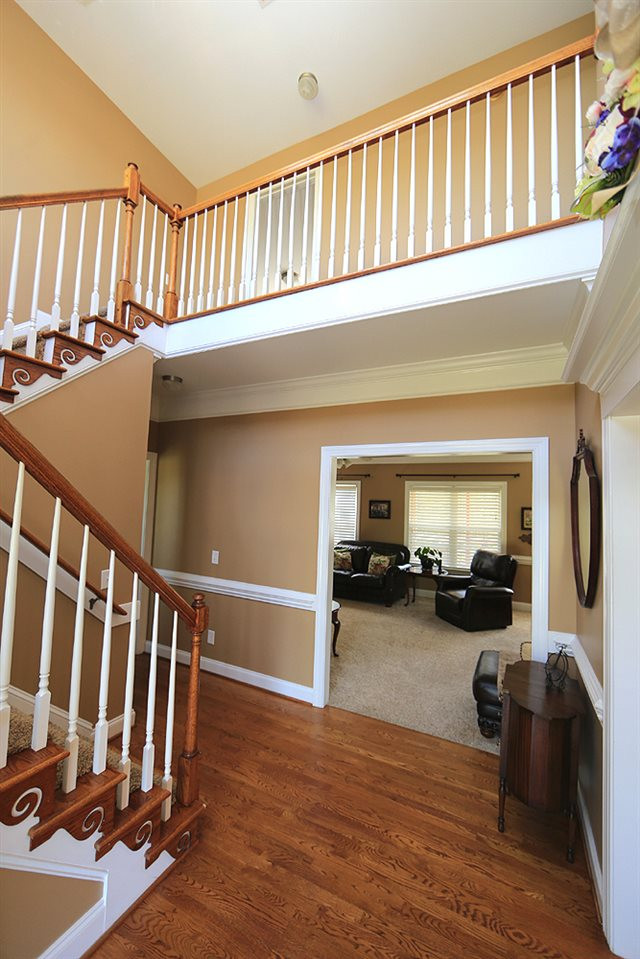 Heart of the house gives you many options - head to the family room - dining area - or upstairs -your choice! Open Foyer