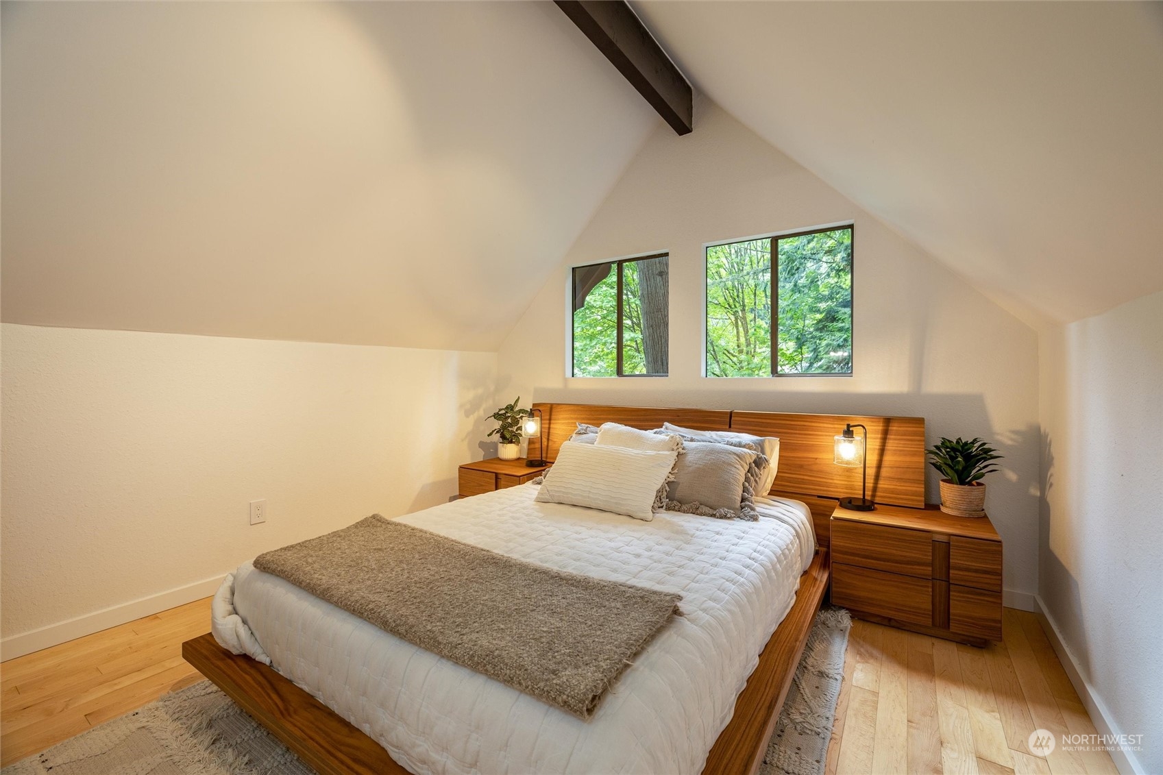 32-34 Maple Court Bellingham, WA 98229 - Photo 15 of 31 a bedroom with a bed and wooden floor
