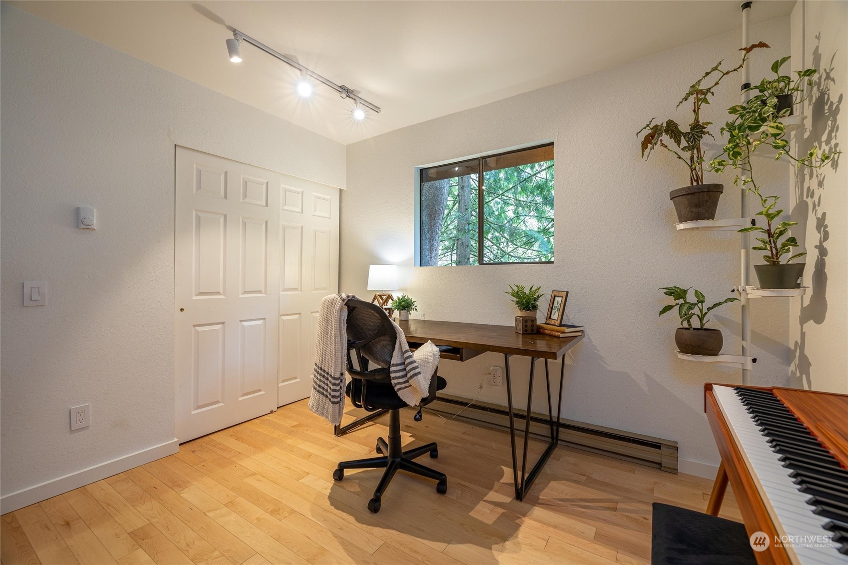32-34 Maple Court Bellingham, WA 98229 - Photo 22 of 31 a workspace with furniture and a window
