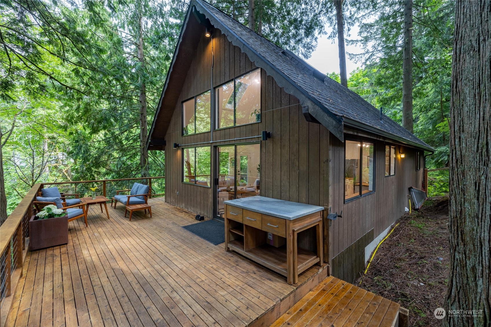 32-34 Maple Court Bellingham, WA 98229 - Photo 3 of 31 a view of house with backyard outdoor seating and deck