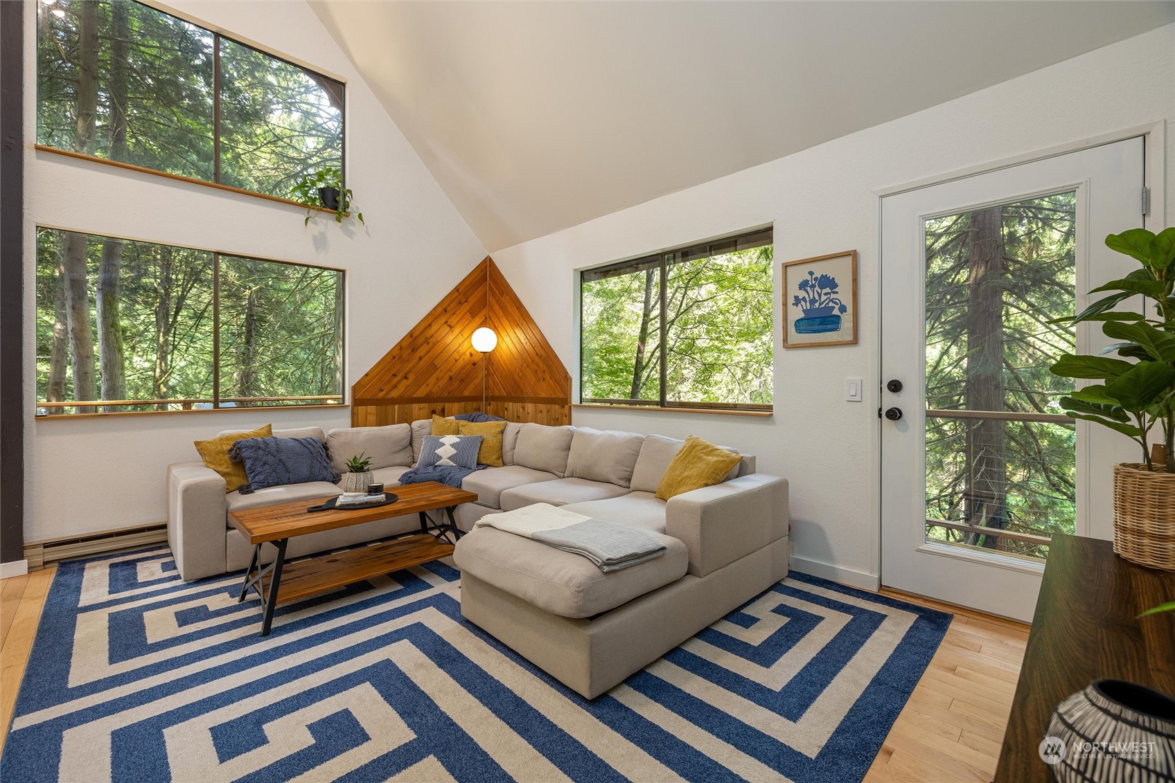 32-34 Maple Court Bellingham, WA 98229 - Photo 7 of 31 a living room with furniture and a large window