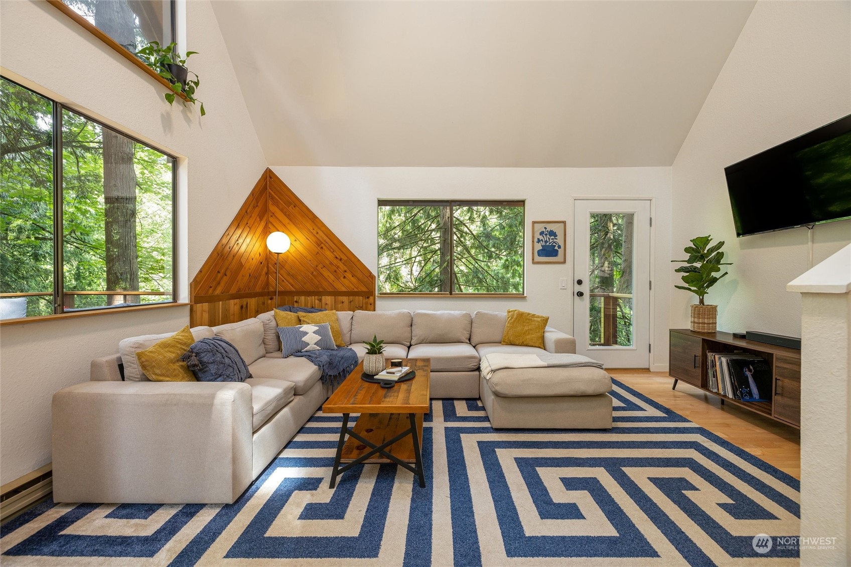 32-34 Maple Court Bellingham, WA 98229 - Photo 8 of 31 a living room with furniture and a flat screen tv