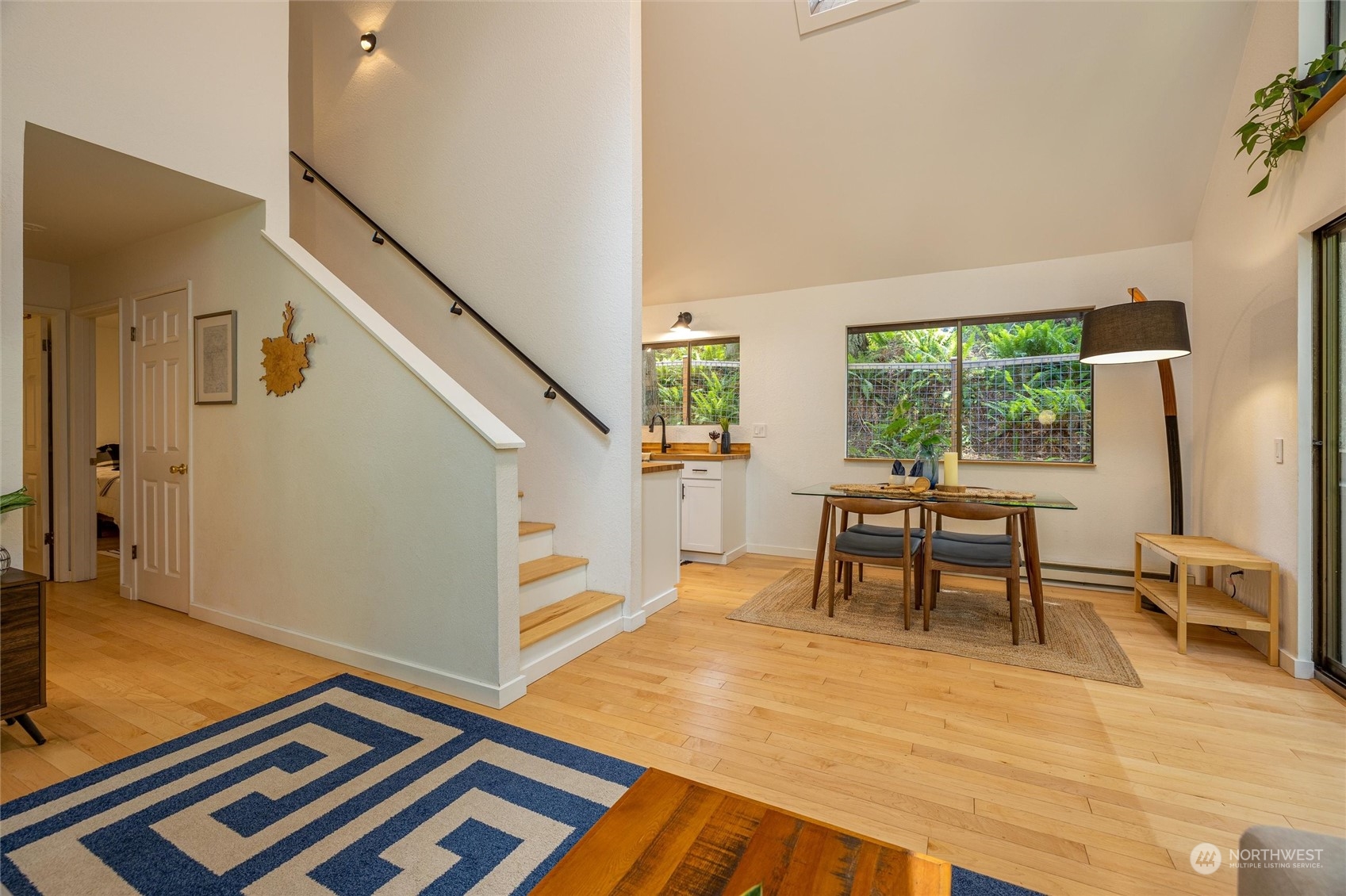 32-34 Maple Court Bellingham, WA 98229 - Photo 9 of 31 a view of dining room with furniture a rug and wooden floor
