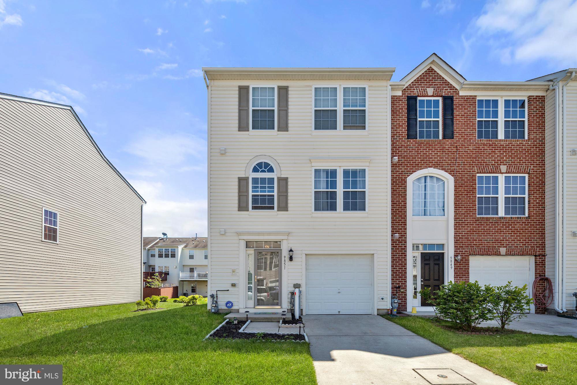 9851 Decatur Road Baltimore, MD 21220 - Photo 1 of 24 a front view of a house with a yard