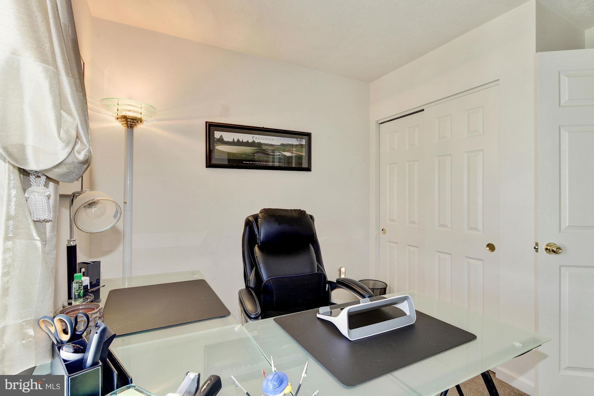 9851 Decatur Road Baltimore, MD 21220 - Photo 20 of 24 a room with furniture and a mirror